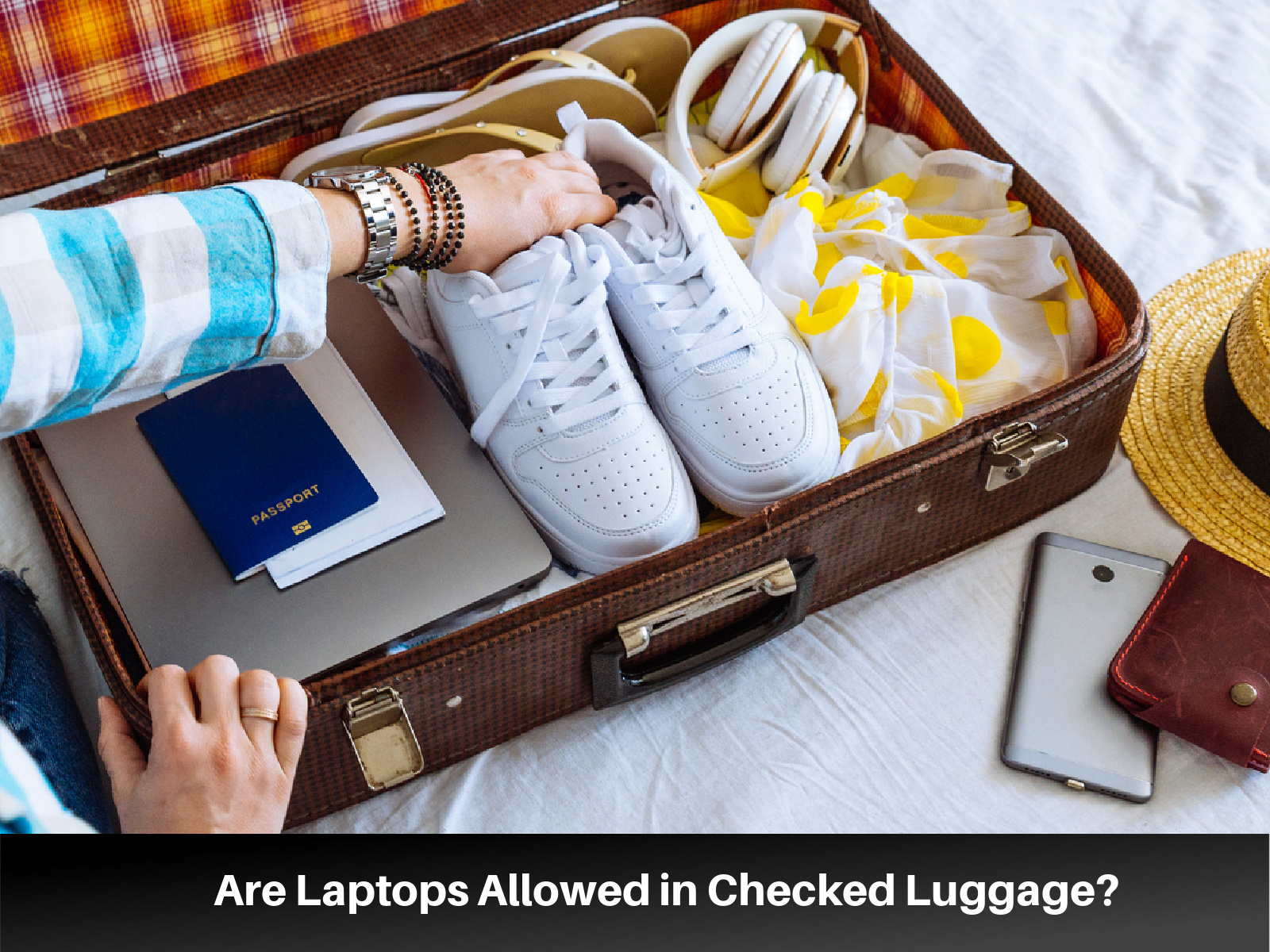 Can I Put Laptop in Check in Baggage